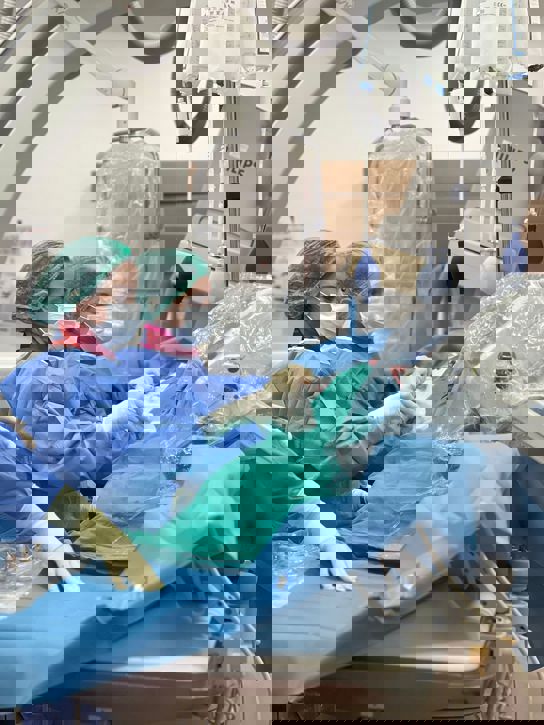 Dr. Songul Senadim in the interventional suite performing a mechanical thrombectomy